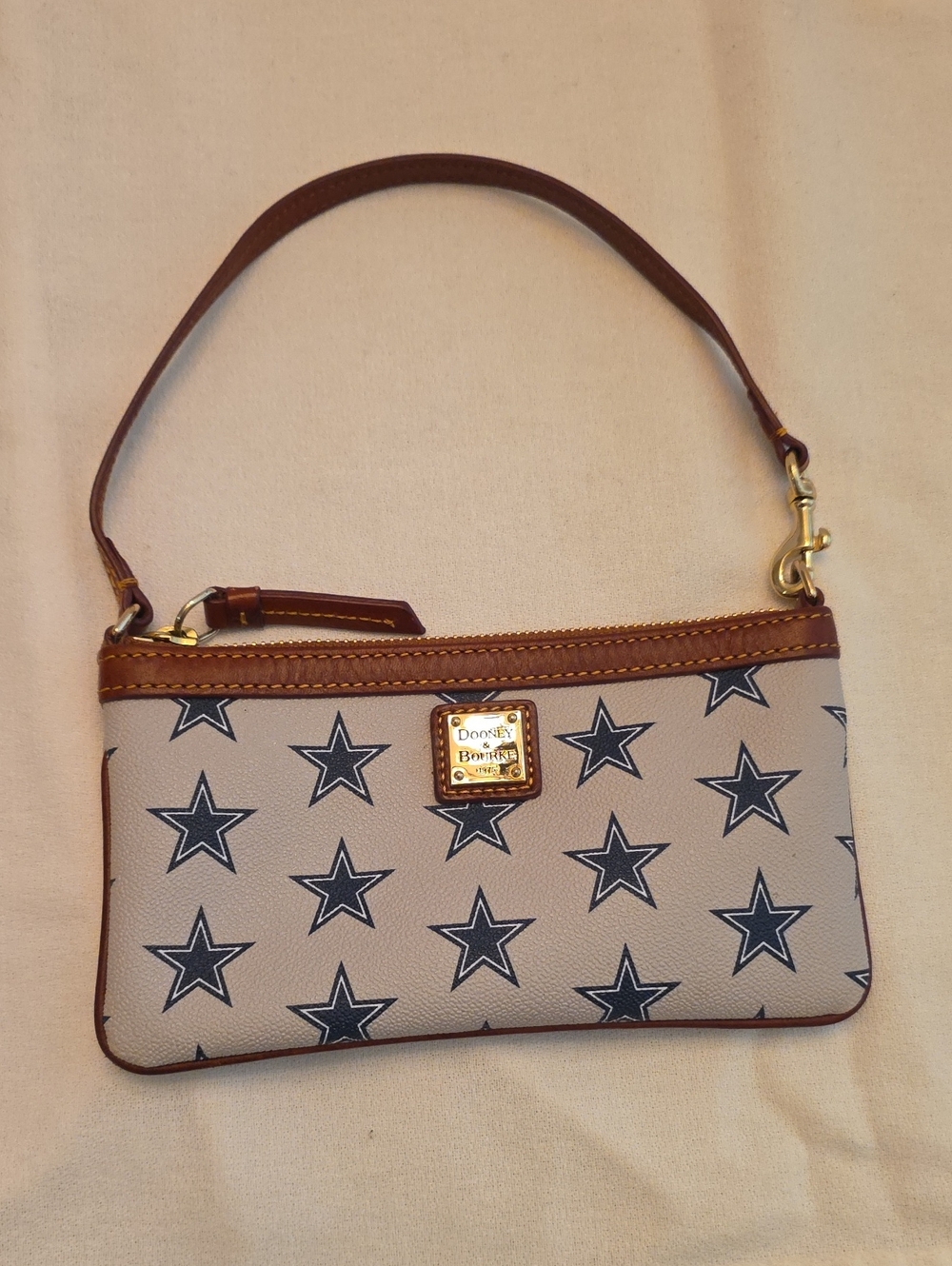 Dooney & Bourke Beige Wristlet with Navy Star Print